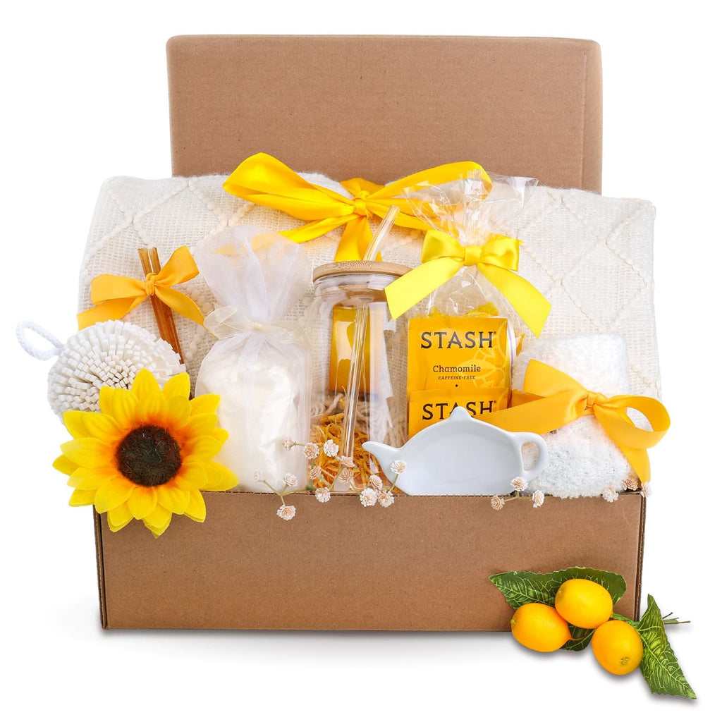 Gift basket with yellow ribbons, a sunflower, and a 'Stash' tea bag on a white background