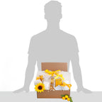 Gift box with blanket, glass and tea on a white background