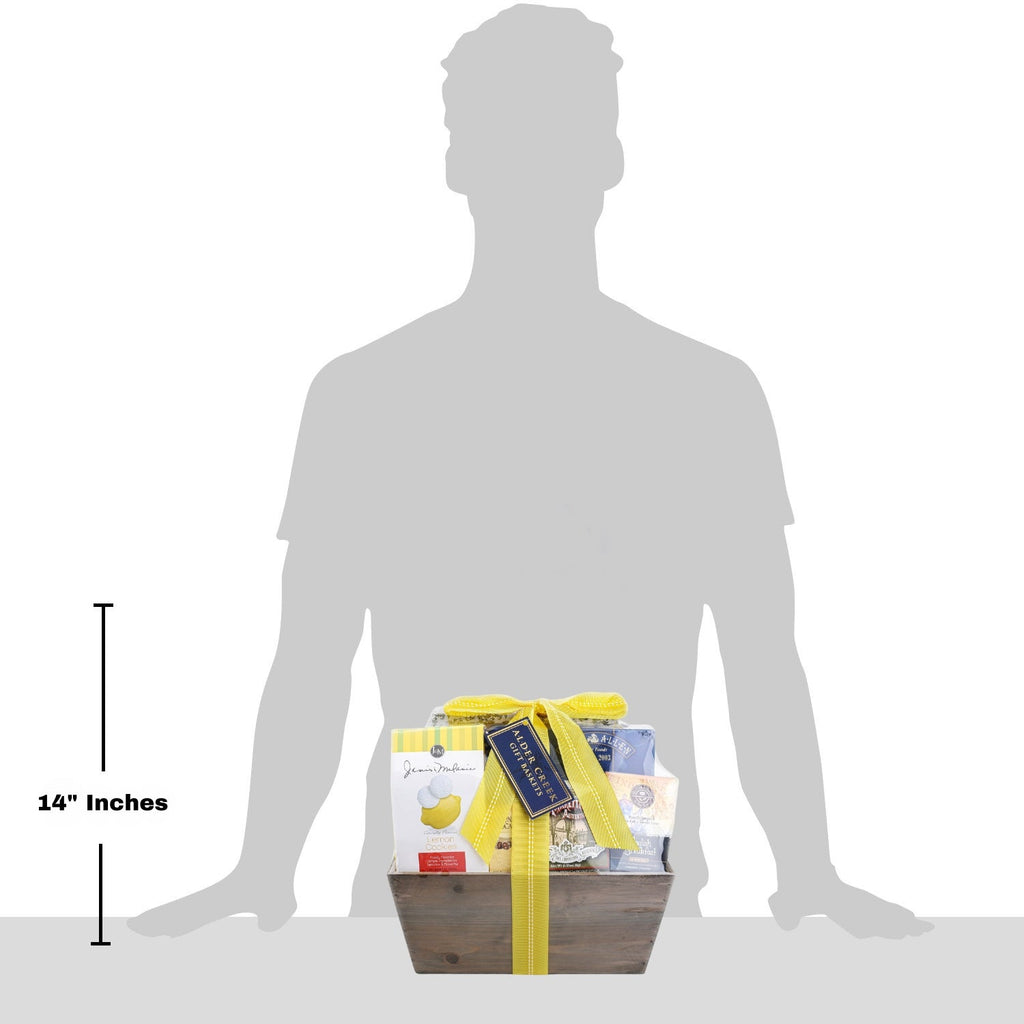 Gift basket with a yellow ribbon shown next to a silhouette of a person for size reference.
