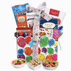 Birthday gift with some food contents displayed in white dishes