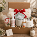 Gift basket with tea, flowers, and decorative items on a wooden surface