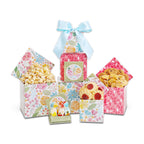Set of floral gift boxes with snacks on a white background