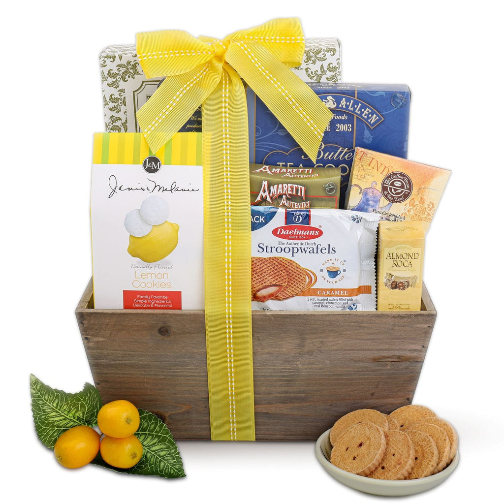 Gift basket with snacks and a yellow ribbon on a white background