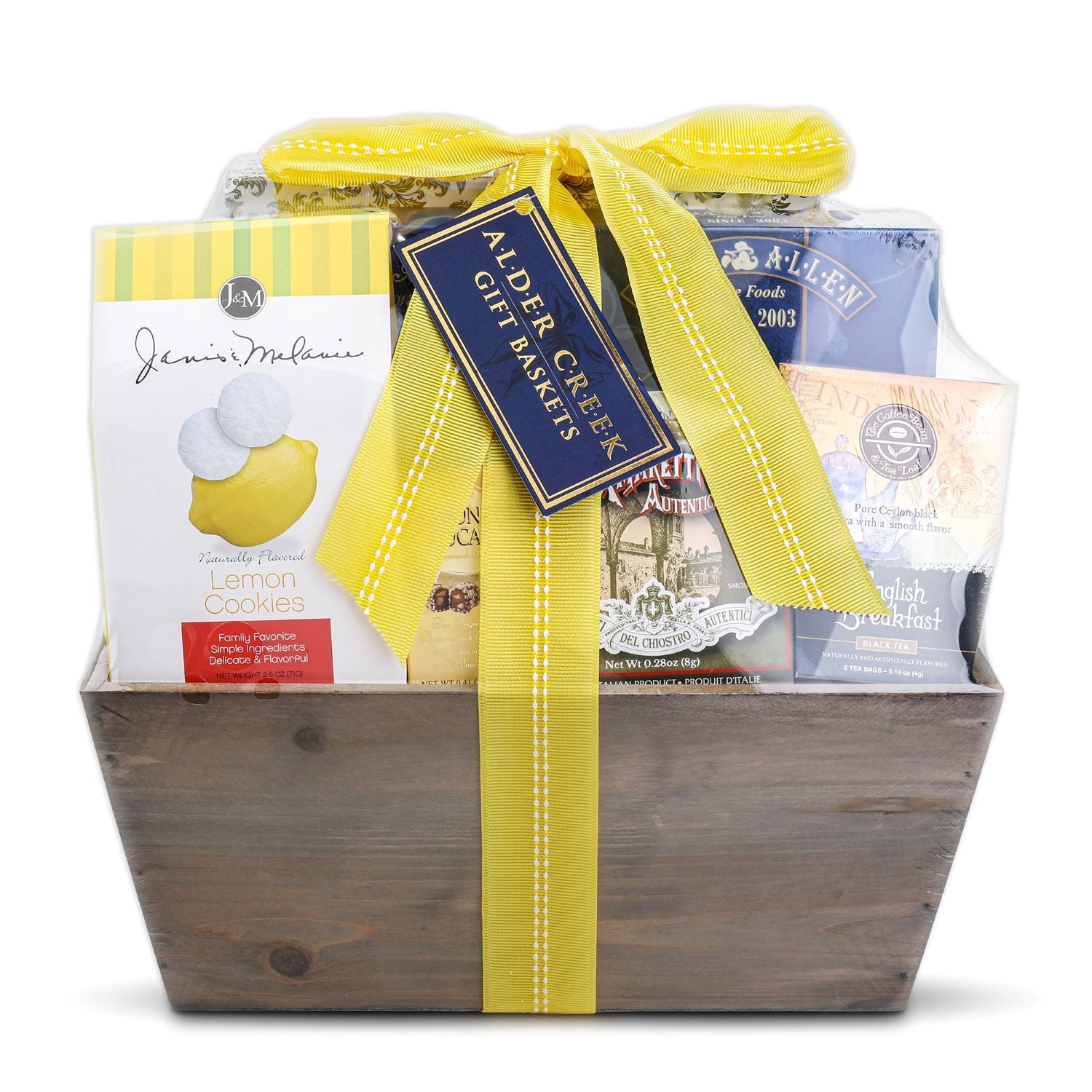 Gift basket with a yellow ribbon and various products inside on a white background