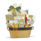 Gift basket with assorted snacks and treats on a white background